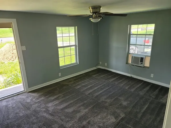 an empty room with windows