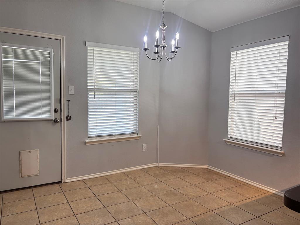 9704 Mystic Dunes Drive McKinney, TX 75072 - Photo 15 of 17 a view of an empty room with window