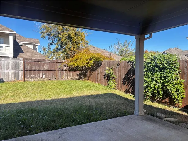 a house with swimming pool in front of it