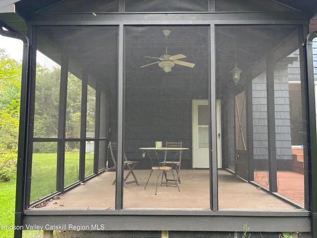 a view of living room and a window