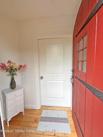 a view of a hallway to a house