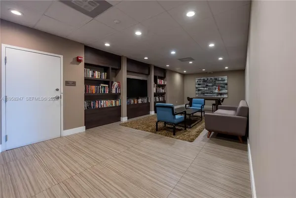 a view of livingroom with furniture and wooden floor