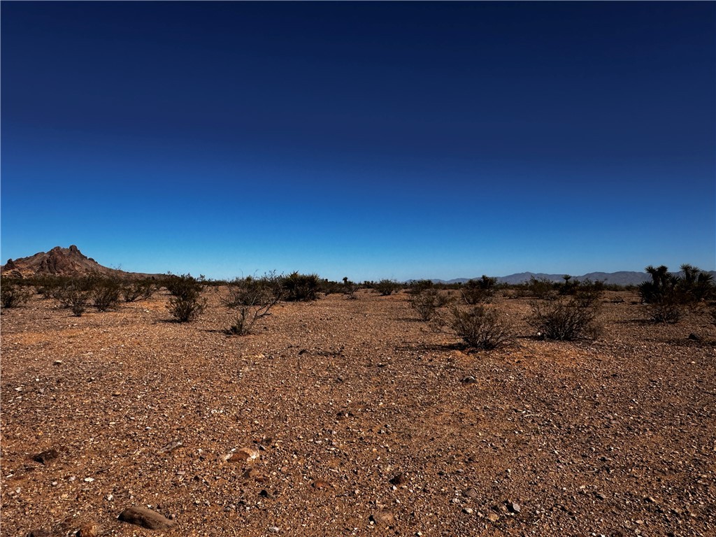 3948 Kaibab Road, Unit 6/10 Golden Valley, AZ 86413 - Photo 14 of 16 View of undeveloped land with mountains and rural landscape