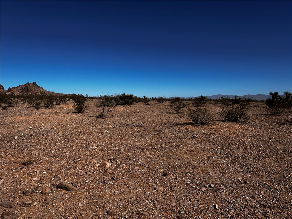 3948 Kaibab Road, Unit 6/10 Golden Valley, AZ 86413 - Photo 15 of 16 View of local wilderness with a mountain backdrop