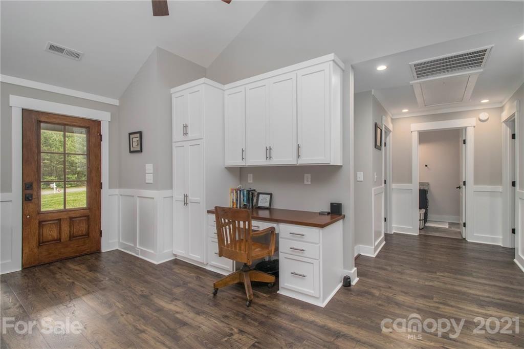 10685 Fink Road Mount Pleasant, NC 28124 - Photo 8 of 41 a room view with wooden floor and windows