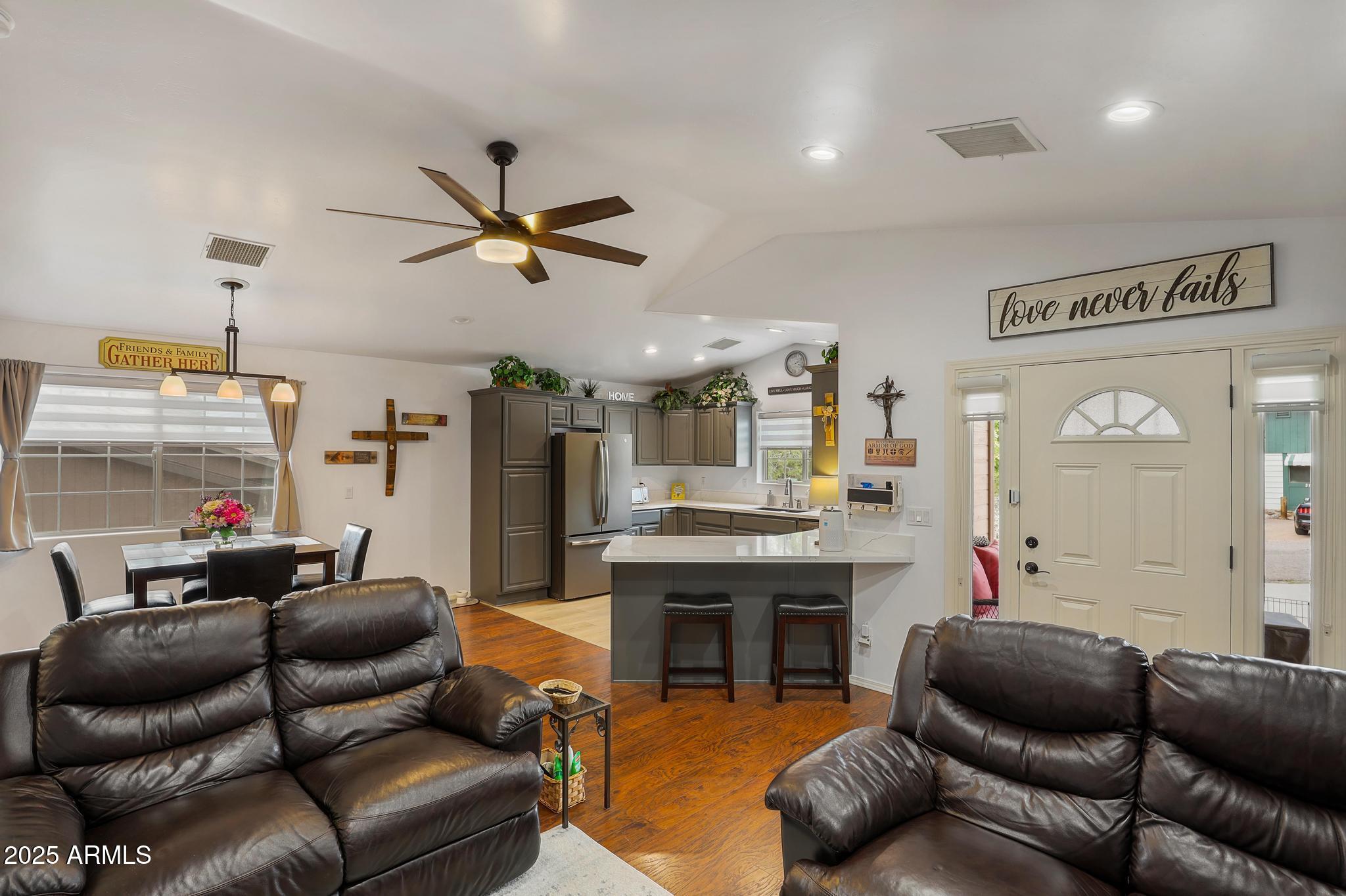 317 East Pine Street Payson, AZ 85541 - Photo 12 of 25 a living room with furniture and a fireplace