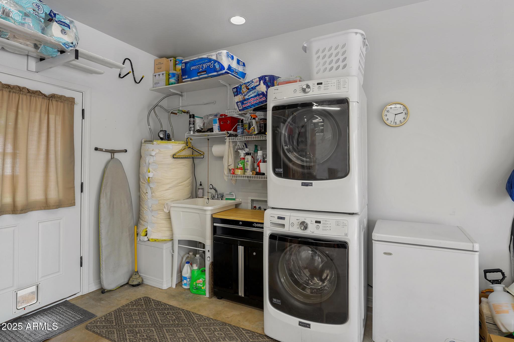 317 East Pine Street Payson, AZ 85541 - Photo 20 of 25 a utility room with fridge and washer