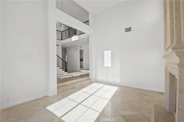 a view of an entryway with a chandelier