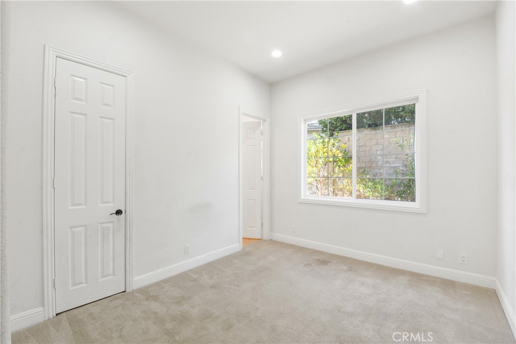 4925 Lone Acres Court Rancho Cucamonga, CA 91737 - Photo 23 of 68 an empty room with windows