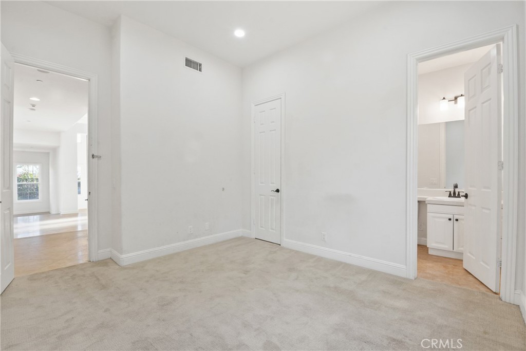 4925 Lone Acres Court Rancho Cucamonga, CA 91737 - Photo 24 of 68 wooden floor in an empty room and a mirror
