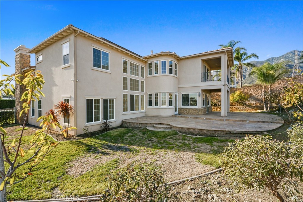 4925 Lone Acres Court Rancho Cucamonga, CA 91737 - Photo 29 of 68 a front view of a house with a yard