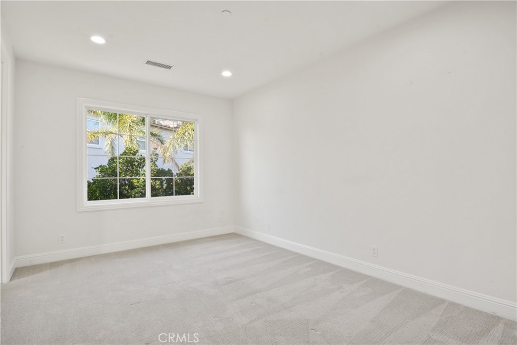 4925 Lone Acres Court Rancho Cucamonga, CA 91737 - Photo 47 of 68 an empty room with a window