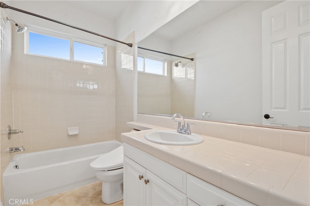 4925 Lone Acres Court Rancho Cucamonga, CA 91737 - Photo 54 of 68 a bathroom with a sink a toilet and shower