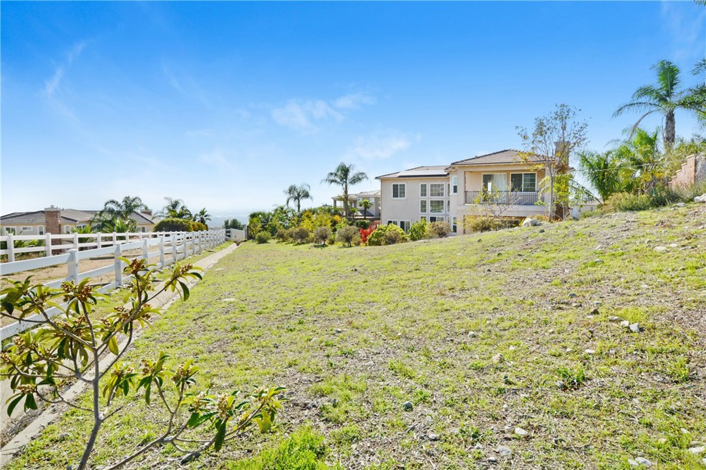 4925 Lone Acres Court Rancho Cucamonga, CA 91737 - Photo 6 of 68 a front view of a house with a yard