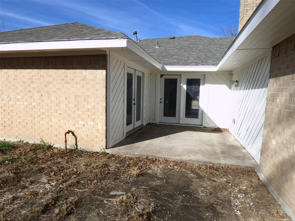 7110 Ridgeview Drive Rowlett, TX 75089 - Photo 26 of 27 a view of a house with a yard and the window