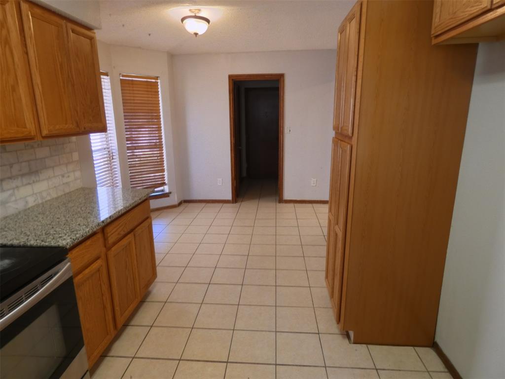 7110 Ridgeview Drive Rowlett, TX 75089 - Photo 10 of 27 a view of a utility room with windows