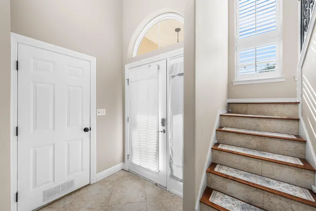 a view of an entryway with staircase