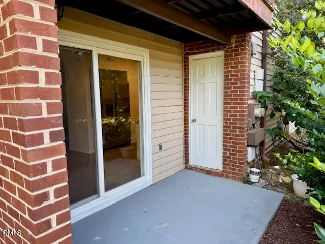 a view of a brick house with a shower