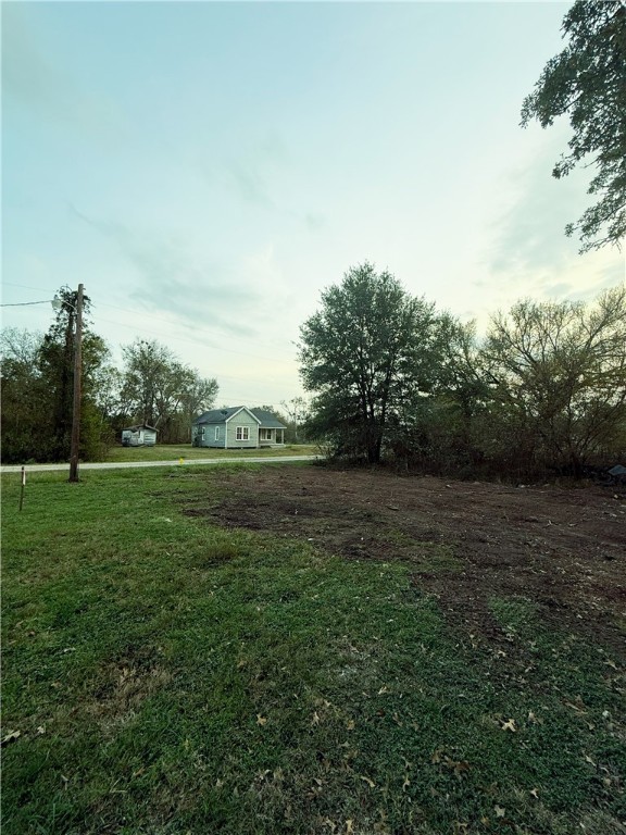 0 West Barton Street Calvert, TX 77837 - Photo 2 of 7 a view of grassy field with trees
