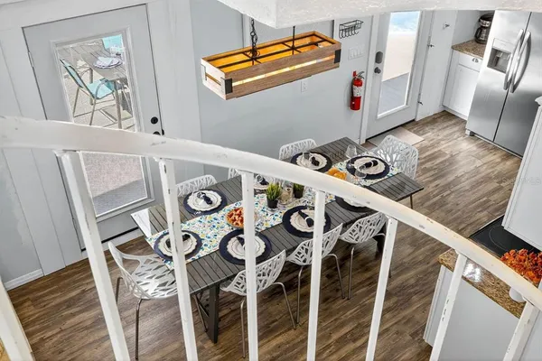 a view of electric appliances and wooden floor