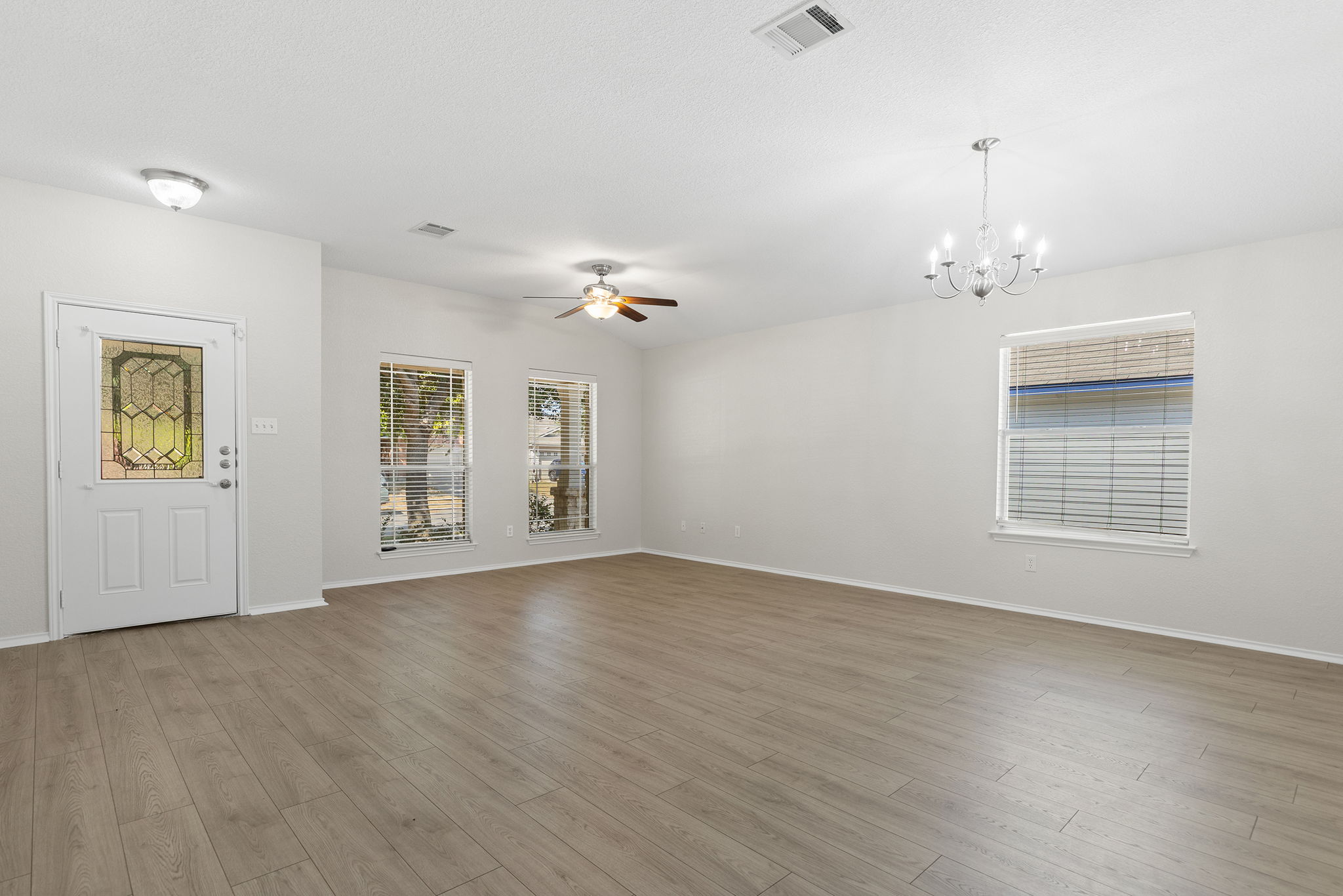 335 Altamont Street Hutto, TX 78634 - Photo 21 of 40 a view of an empty room with a window