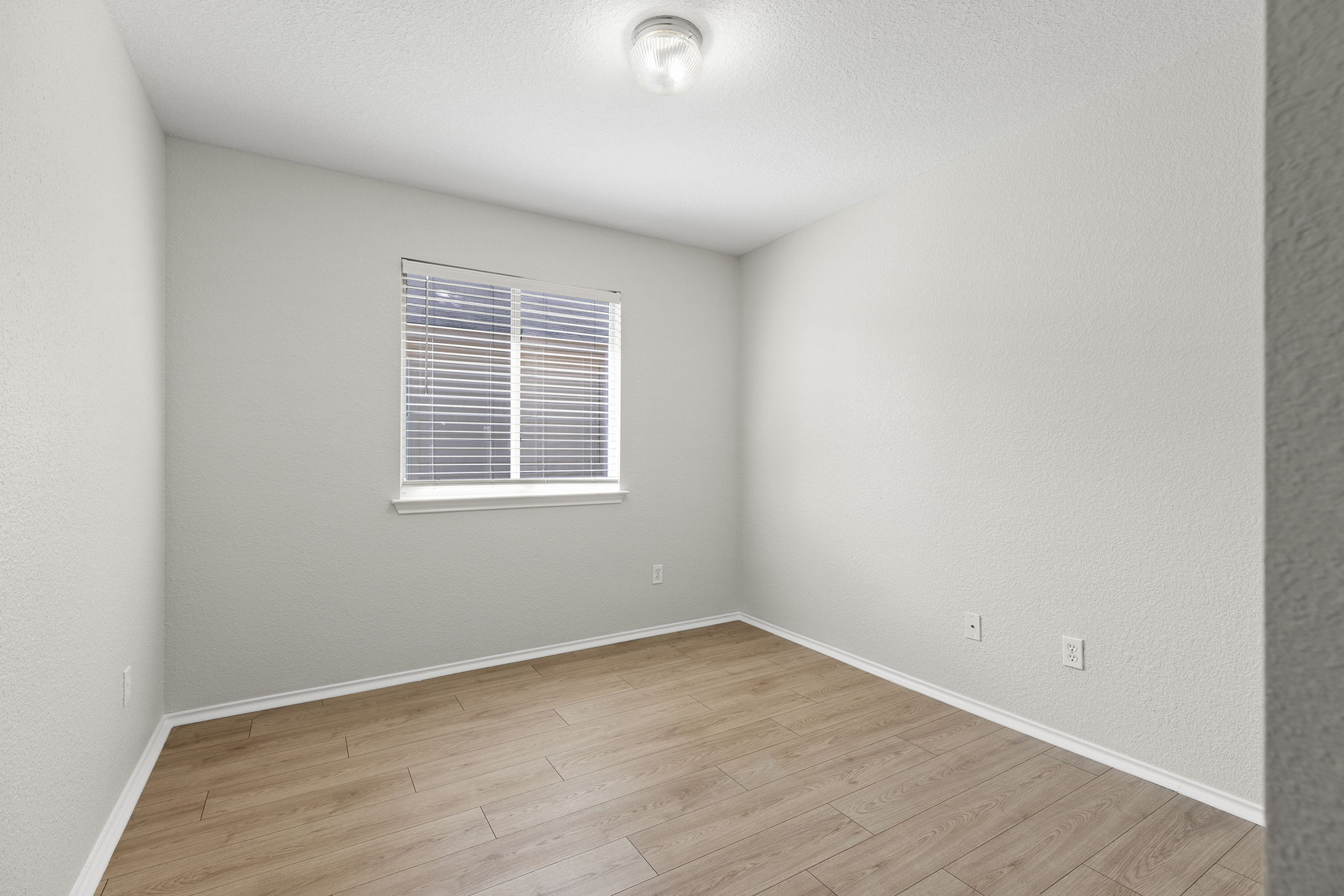 335 Altamont Street Hutto, TX 78634 - Photo 24 of 40 an empty room with a window