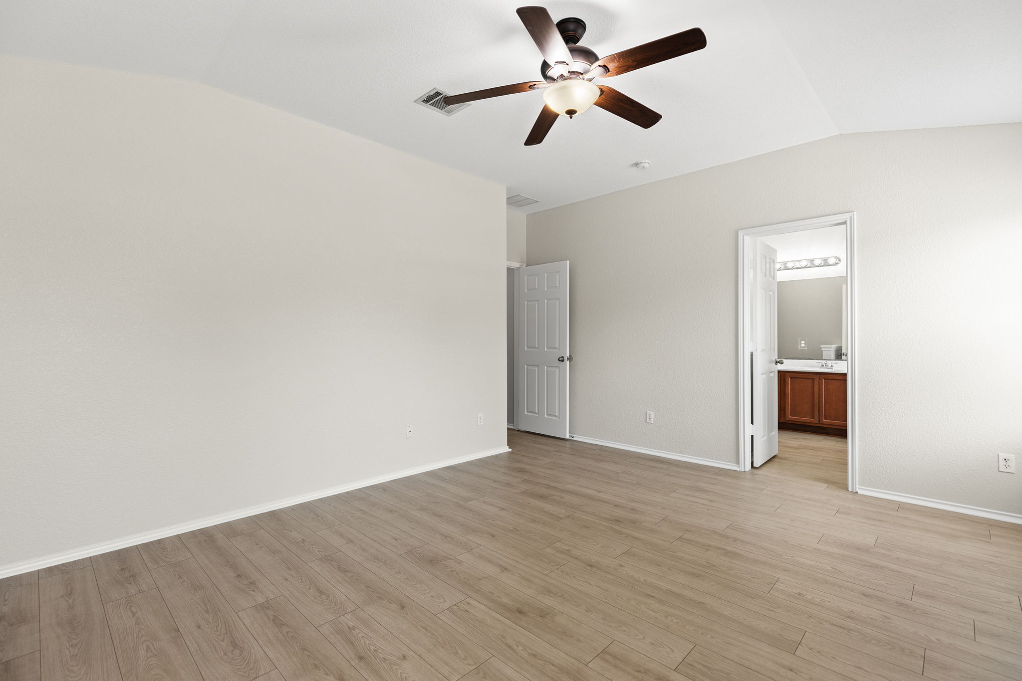 335 Altamont Street Hutto, TX 78634 - Photo 4 of 40 wooden floor in an empty room