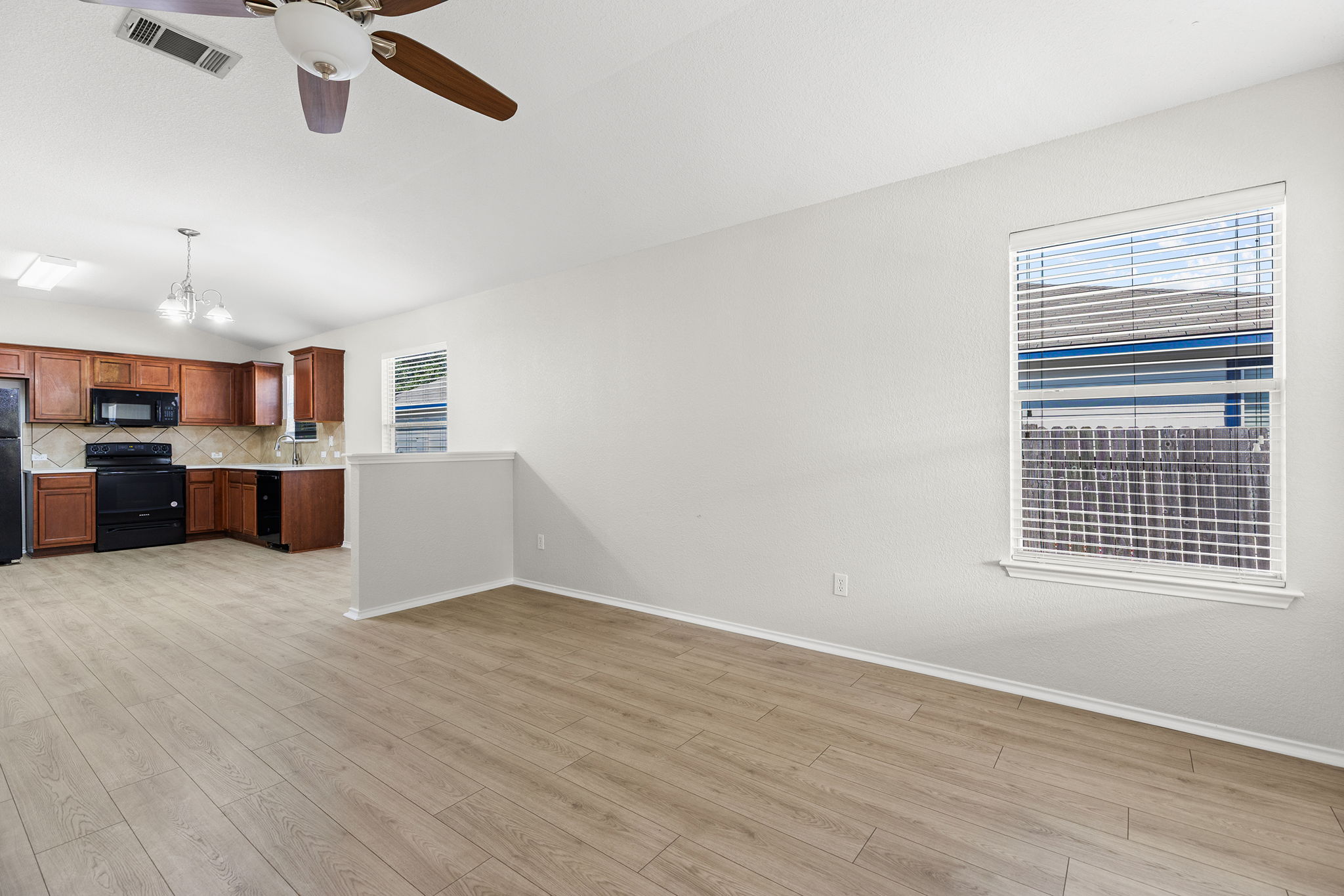 335 Altamont Street Hutto, TX 78634 - Photo 9 of 40 a view of kitchen and windows