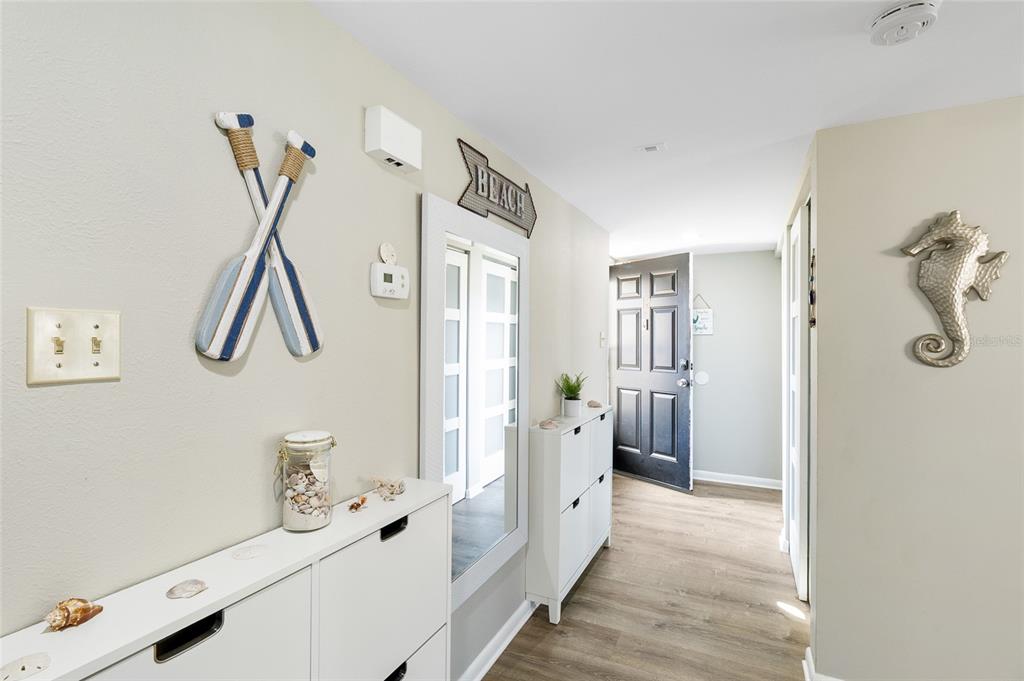 1579 Greenlea Drive, Unit 12 Clearwater, FL 33755 - Photo 16 of 42 a view of an entryway with wooden floor