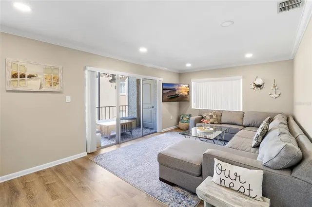 a living room with furniture and a table