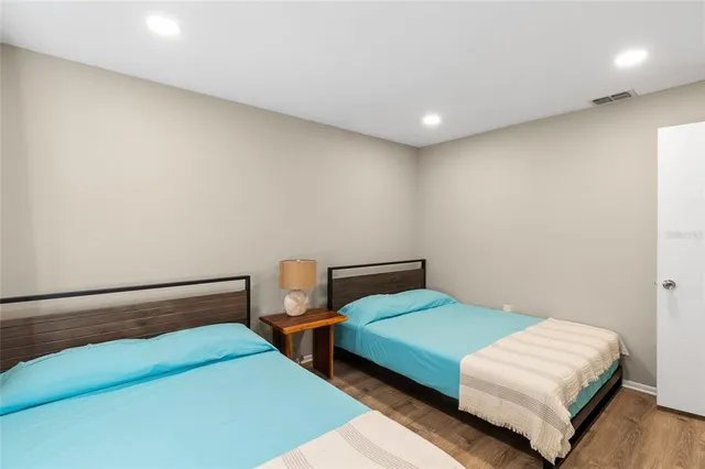 a bedroom with a bed and painted walls