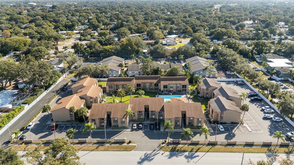 1579 Greenlea Drive, Unit 12 Clearwater, FL 33755 - Photo 40 of 42 an aerial view of a building with garden