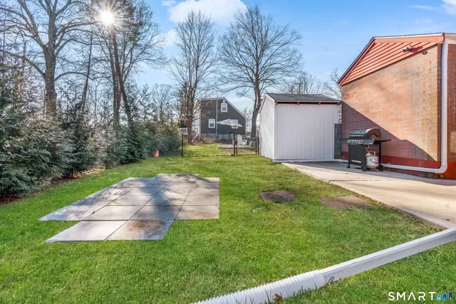 a view of a garden with houses