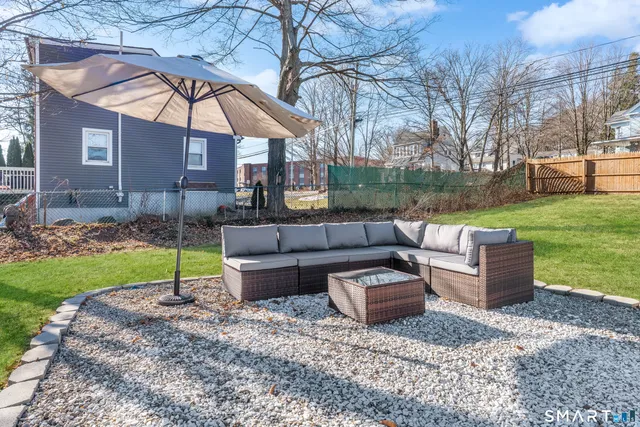 a view of yard with swimming pool