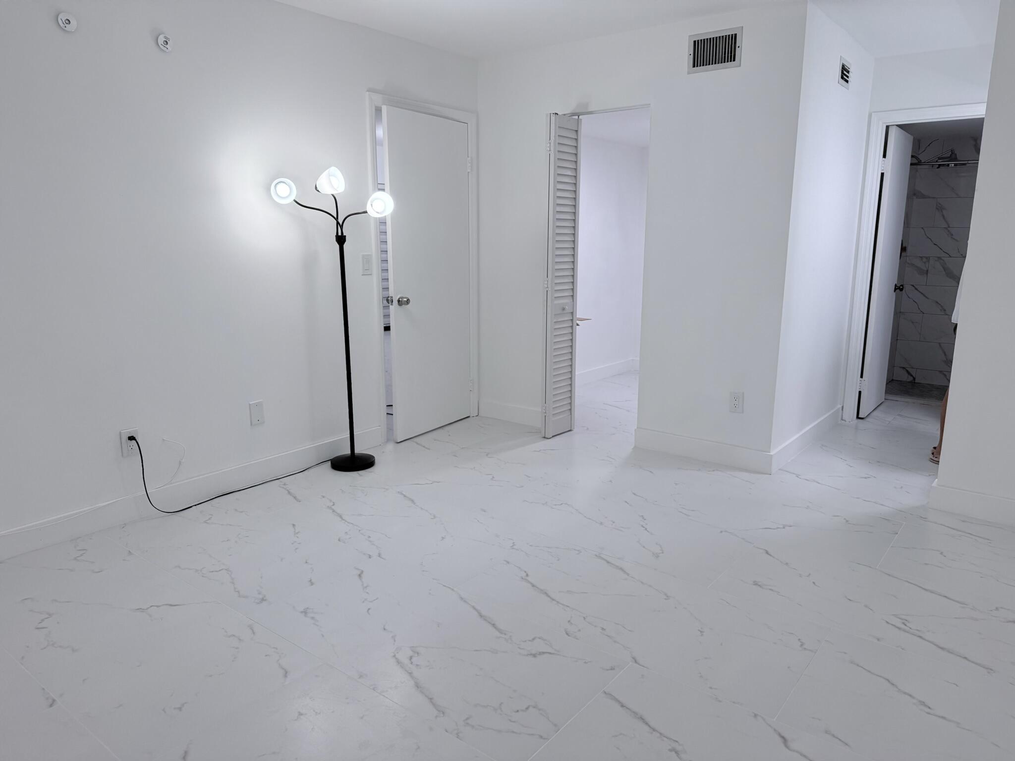 300 East Club Circle, Unit 107 Boca Raton, FL 33487 - Photo 6 of 16 Master Bedroom