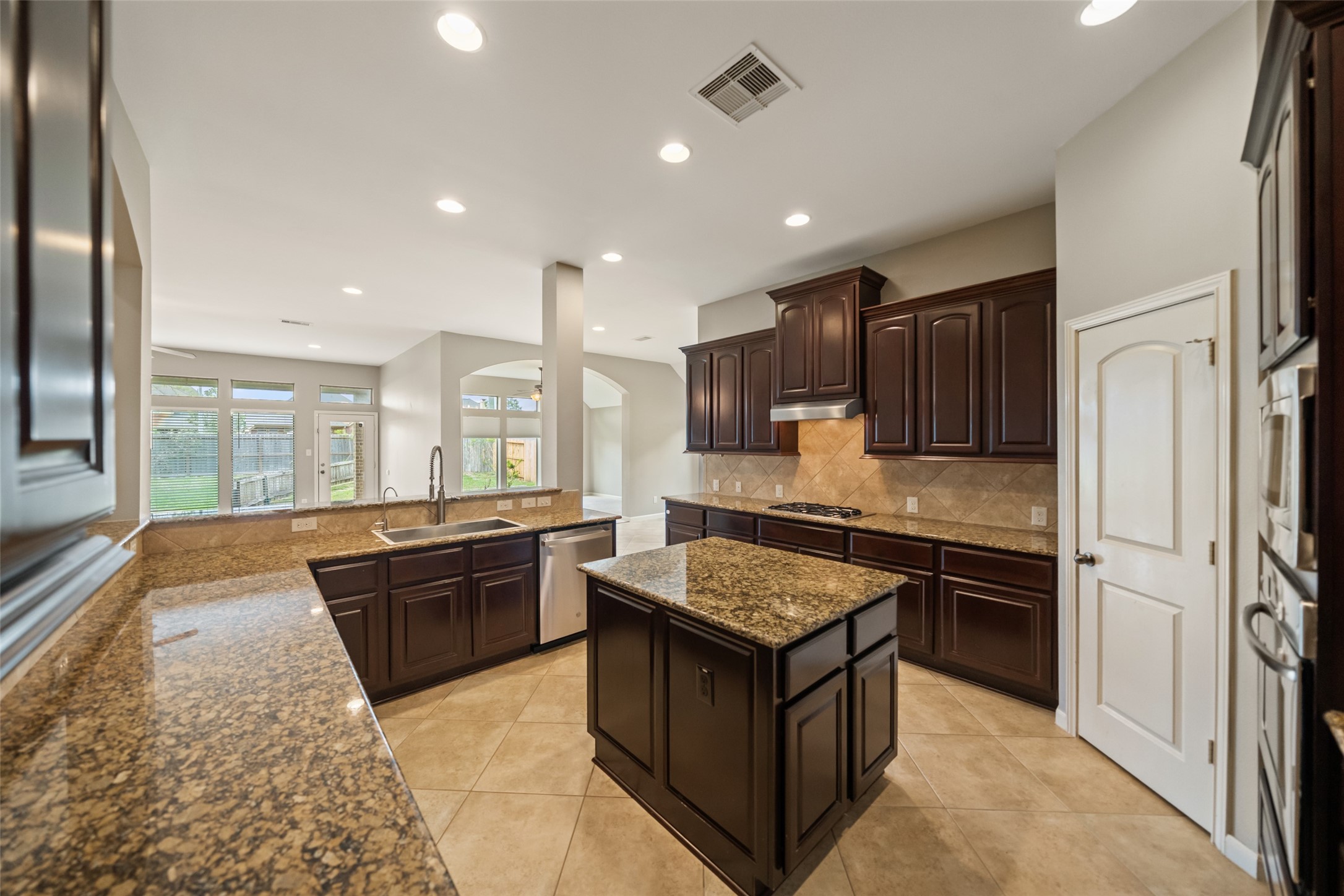 2818 Red Maple Drive Katy, TX 77494 - Photo 11 of 50 Natural light pours in through large windows, and there's ample room for cooking and entertaining.