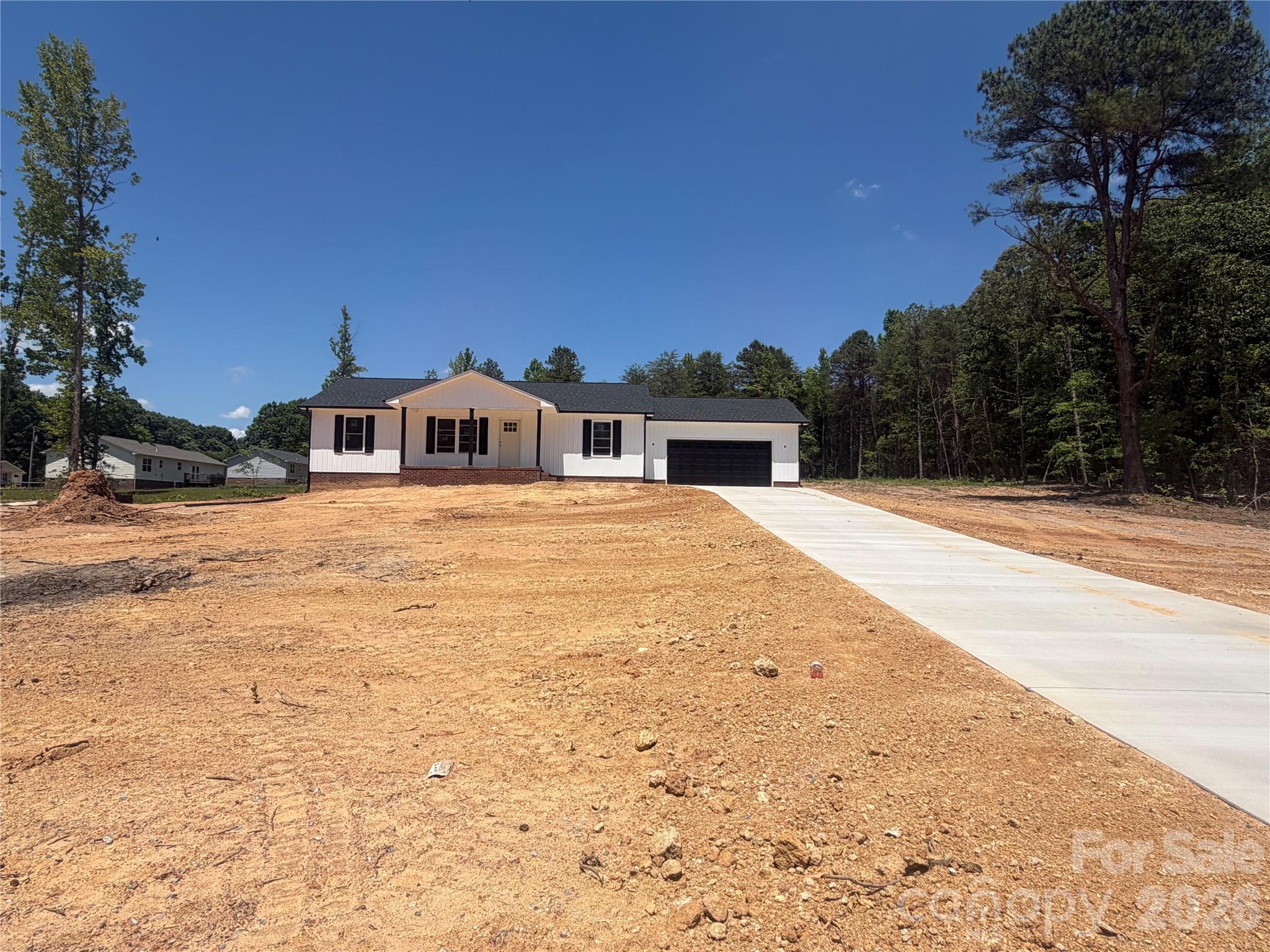 3620 Arrowhead Road Shelby, NC 28150 - Photo 2 of 7 a view of a house with snow on the road