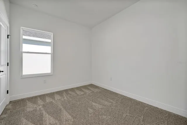 a view of an empty room with window