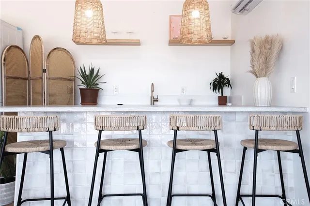 a view of a living room and a wooden floor