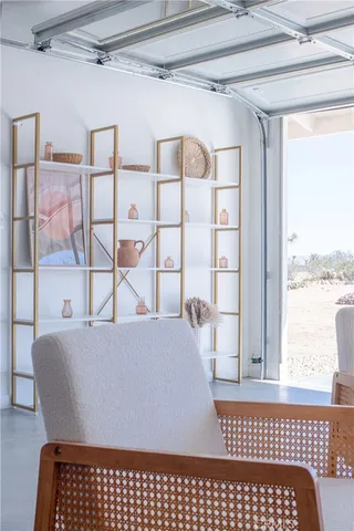 a view of a chairs and table in patio