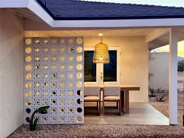 a couple of chairs sitting in a room