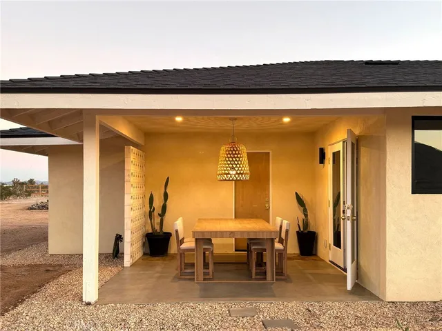a living room with furniture and window