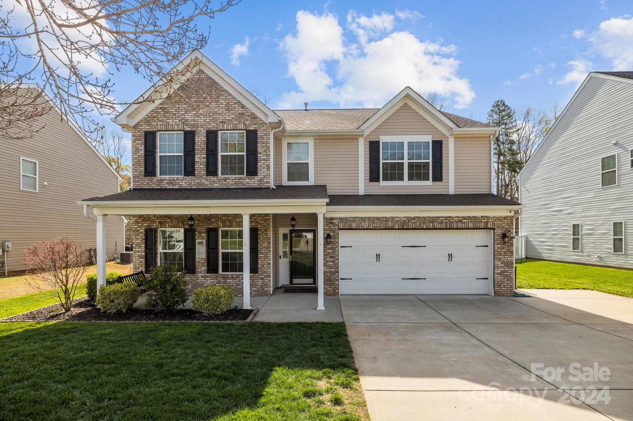 1653 Beleek Ridge Lane Clover, SC 29710 - Photo 1 of 46 a view of a house with garden and tall trees