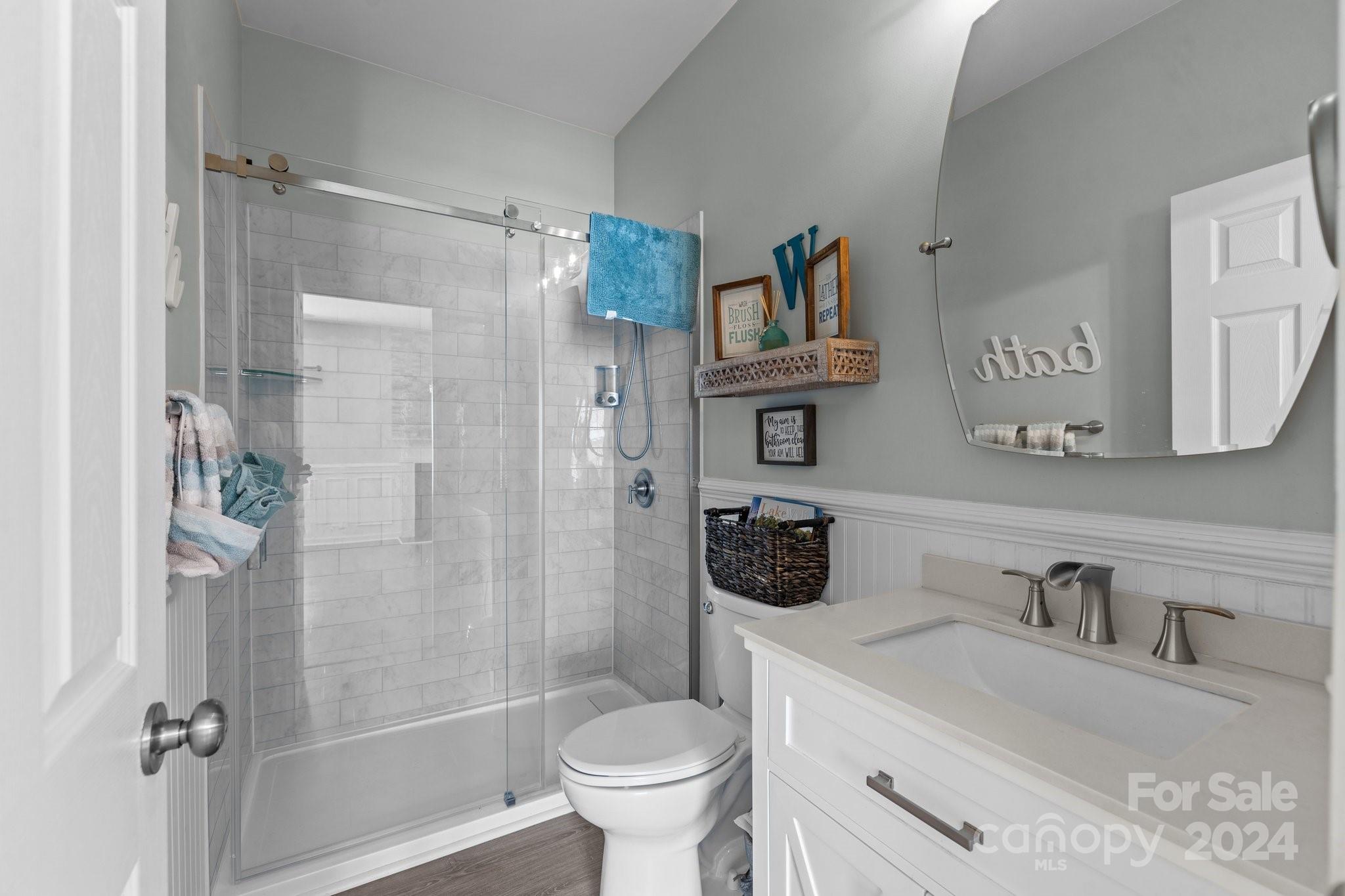 1653 Beleek Ridge Lane Clover, SC 29710 - Photo 19 of 46 a bathroom with a sink toilet and shower