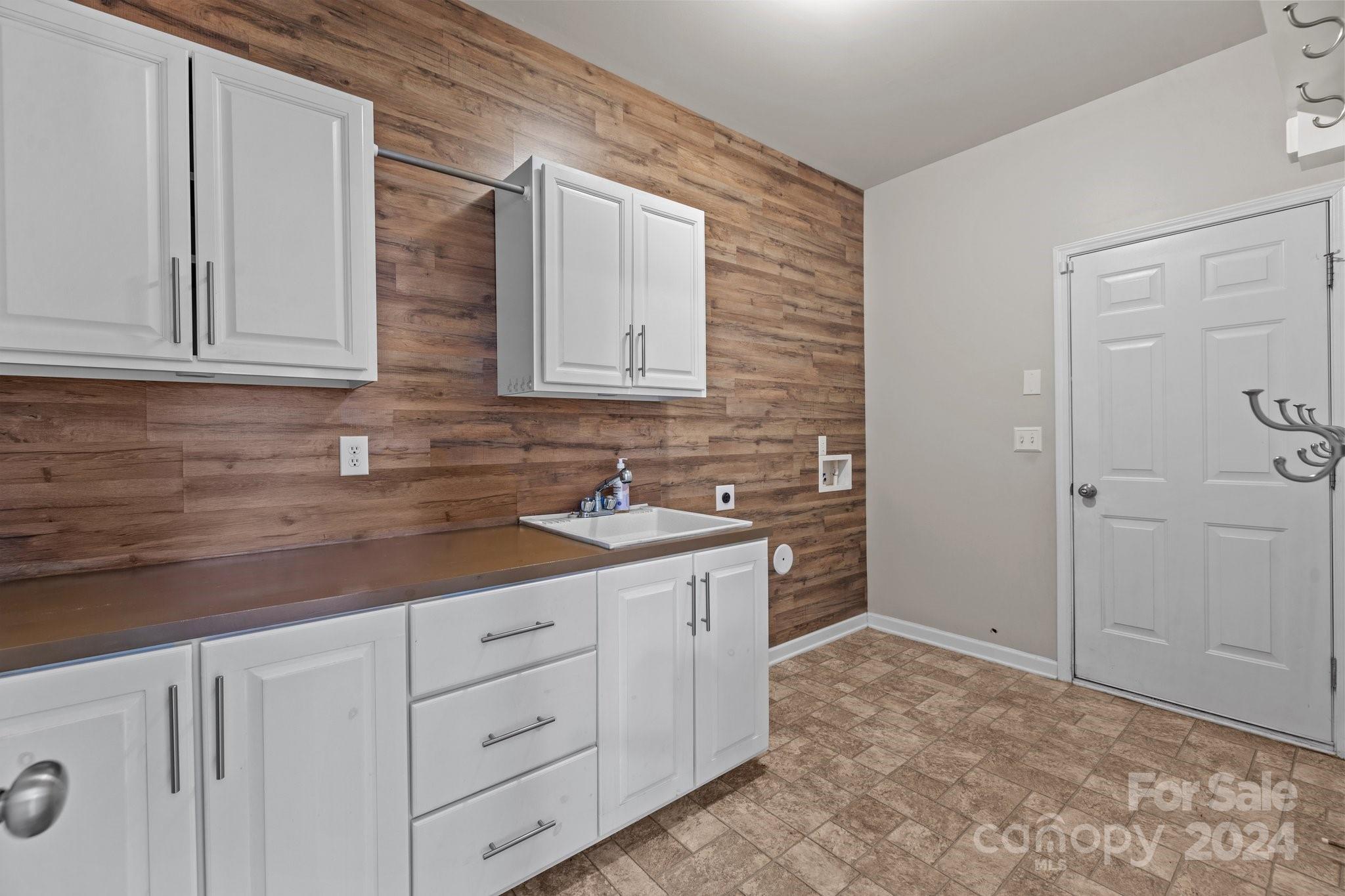 1653 Beleek Ridge Lane Clover, SC 29710 - Photo 20 of 46 a bathroom with a sink and a mirror