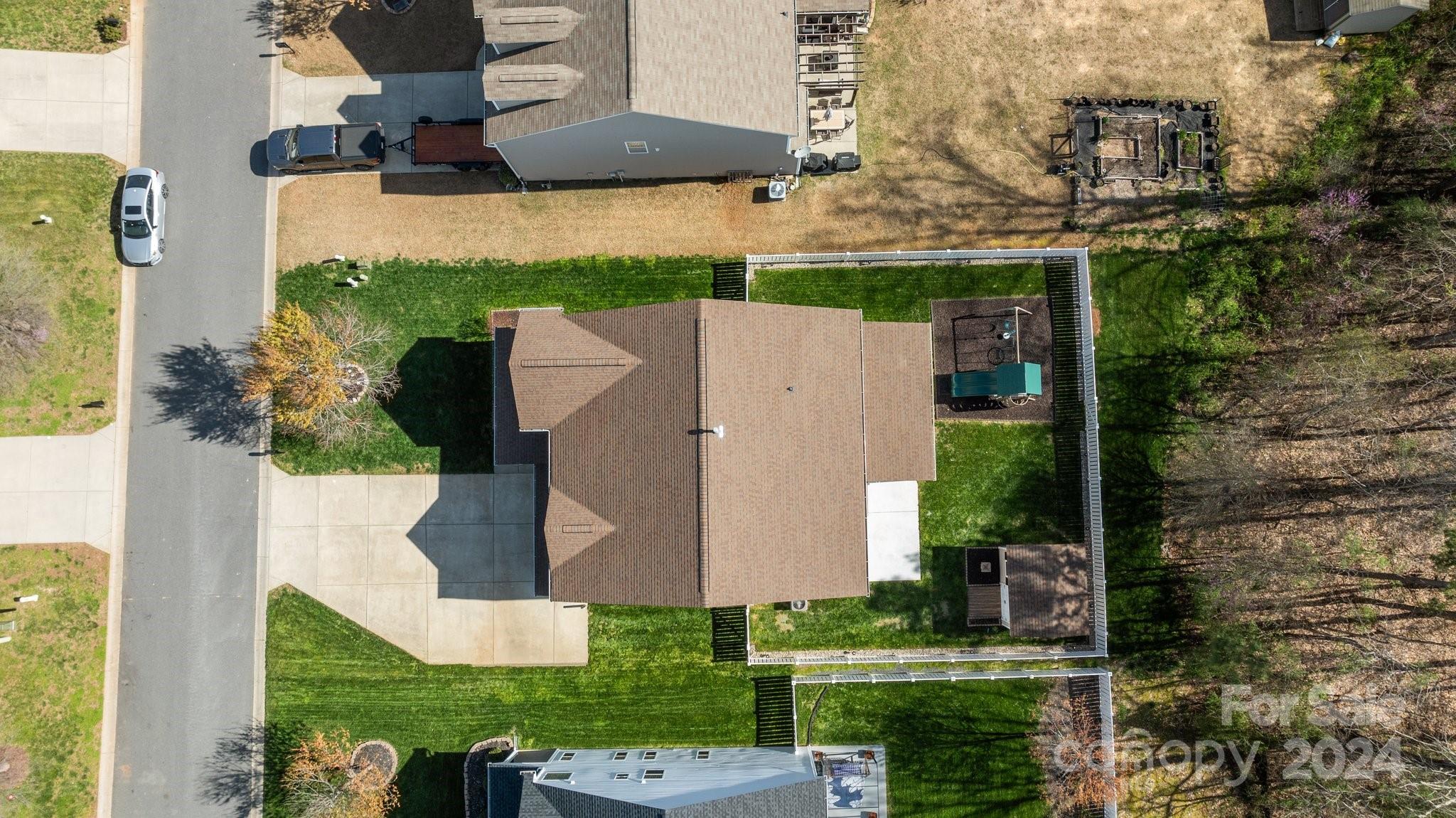 1653 Beleek Ridge Lane Clover, SC 29710 - Photo 38 of 46 an aerial view of a house with a yard and table and chairs
