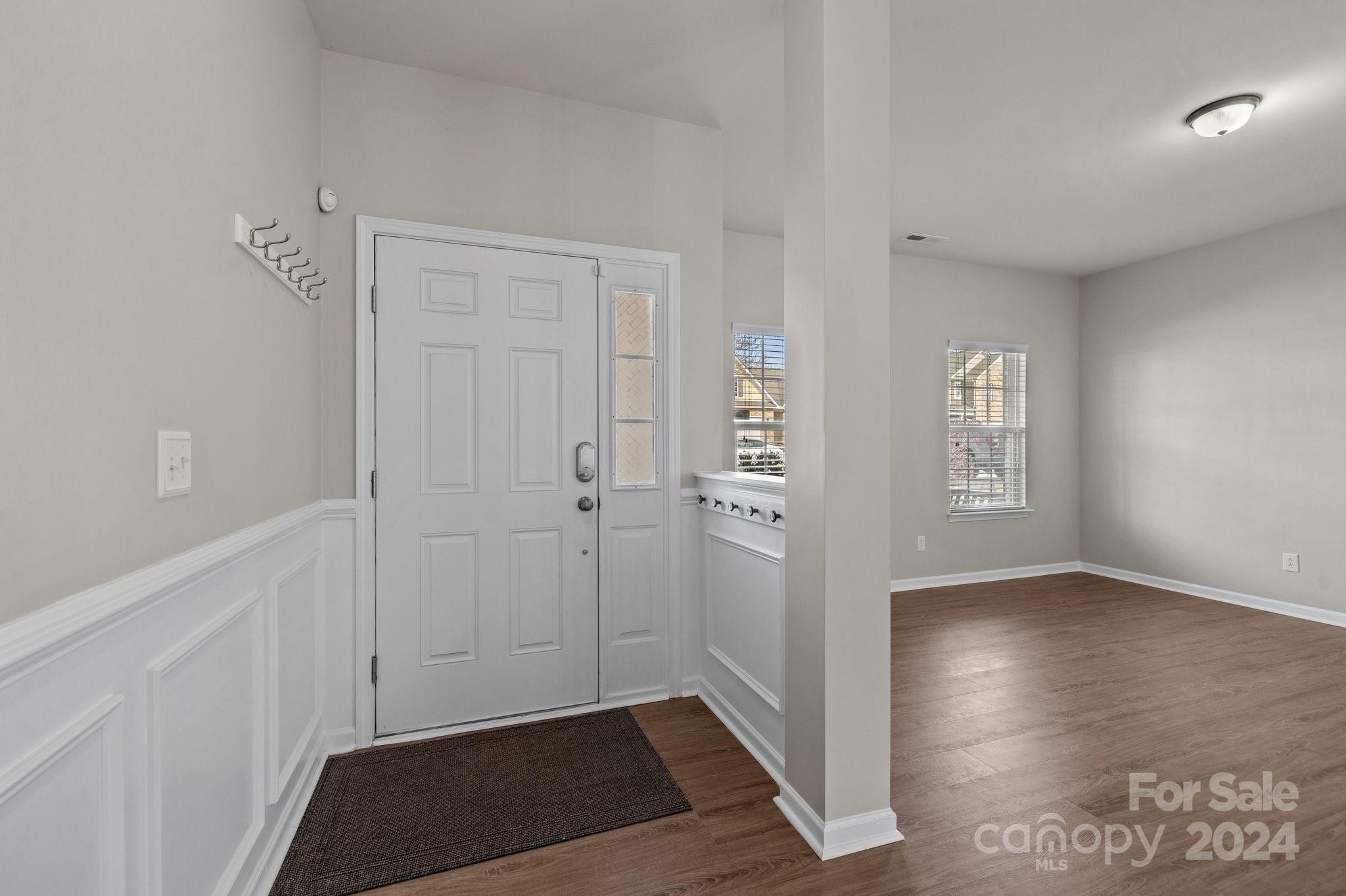 1653 Beleek Ridge Lane Clover, SC 29710 - Photo 5 of 46 a view of an empty room with window and wooden floor