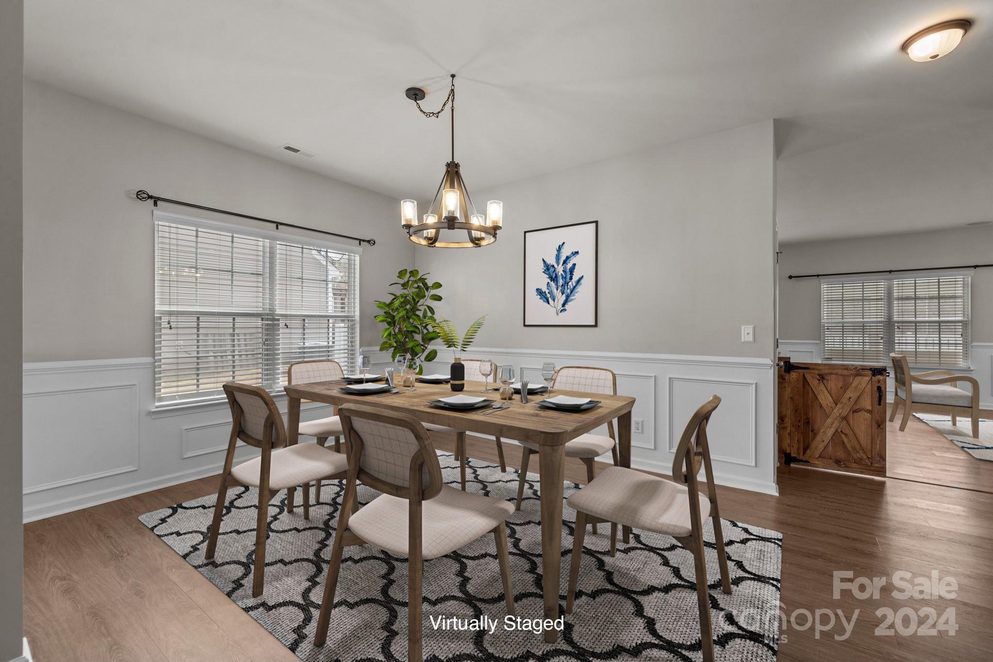 1653 Beleek Ridge Lane Clover, SC 29710 - Photo 6 of 46 a view of a dining room with furniture window and wooden floor