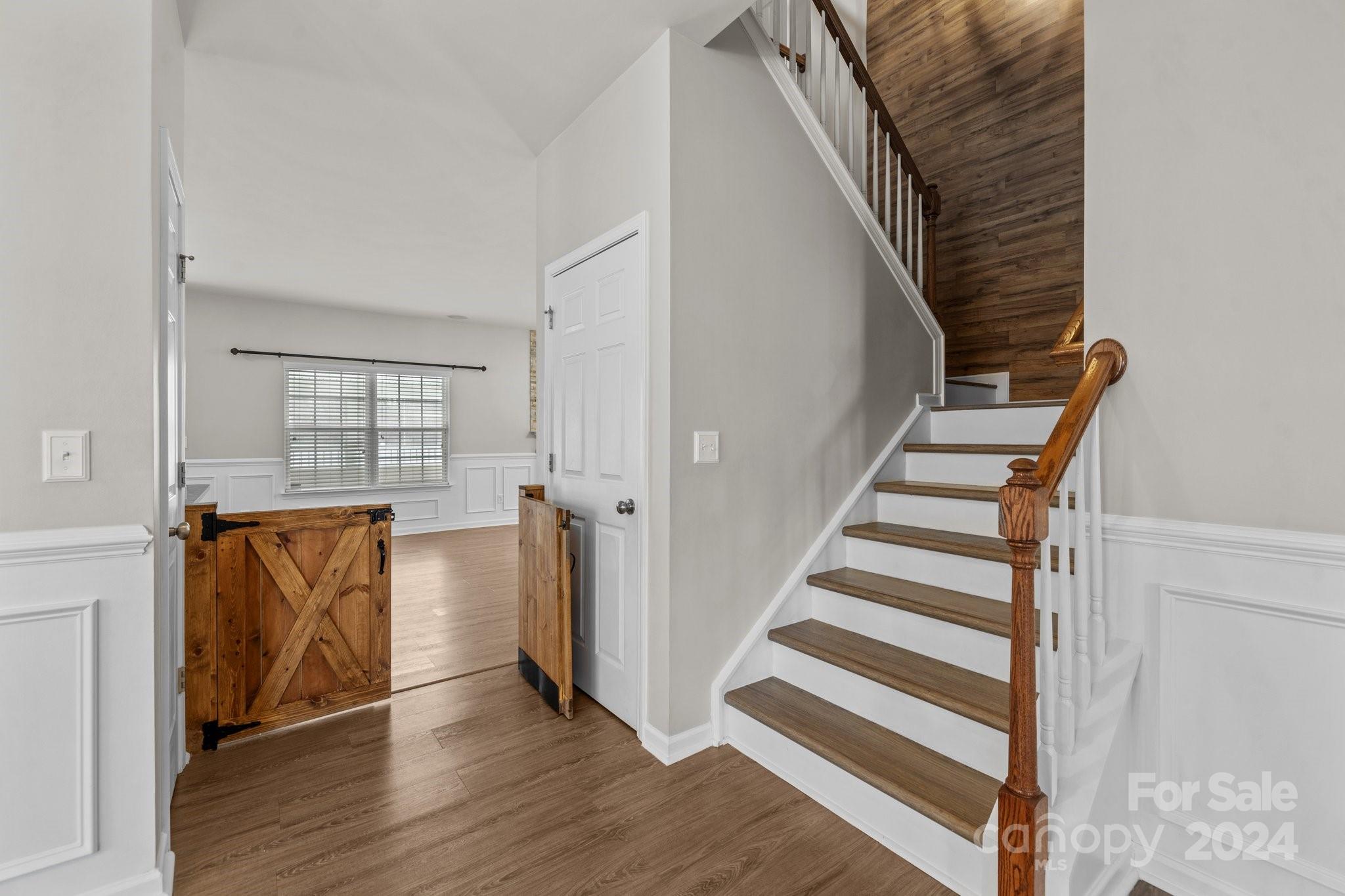 1653 Beleek Ridge Lane Clover, SC 29710 - Photo 8 of 46 a view of front door with hallway and wooden floor