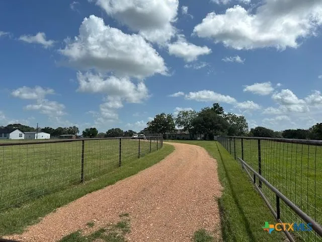 a view of a lake with a garden